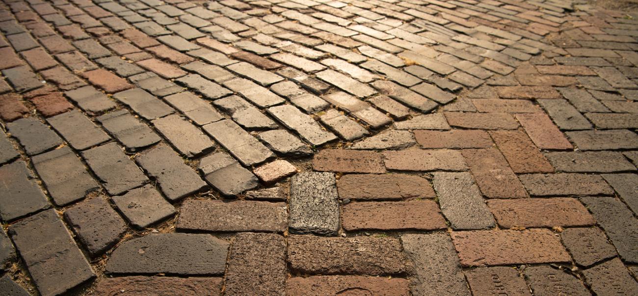 Up close view of red brick walkway
