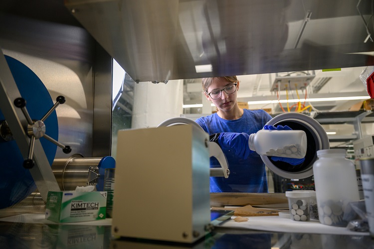 An OHIO researcher works in a lab in the Russ Research Opportunity Center