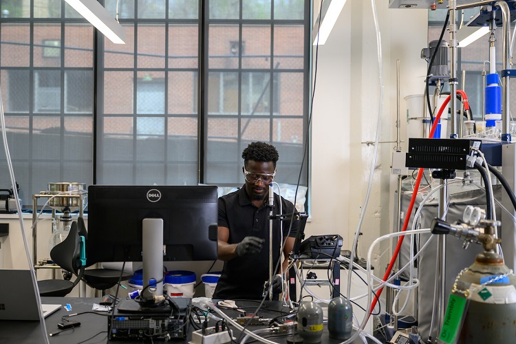 An OHIO researcher works in a lab in the Russ Research Opportunity Center